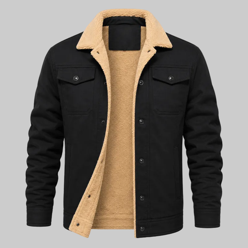 A men's black jacket with a warm beige sherpa fleece lining, featuring a button-up front, chest flap pockets, and a cozy collar, displayed on a clean white background.
